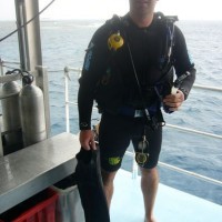 Cal about to jump overboard for one of his certifed dives aboard the majestic Ocean Quest overnight 